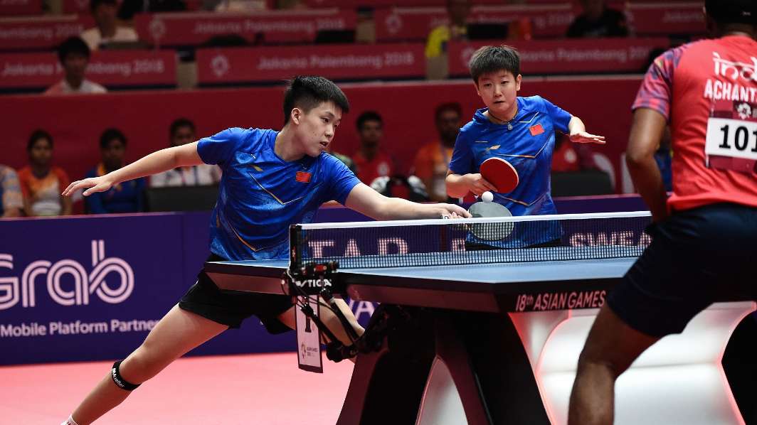 Chinese pair clinch table tennis gold at Asian Games CGTN