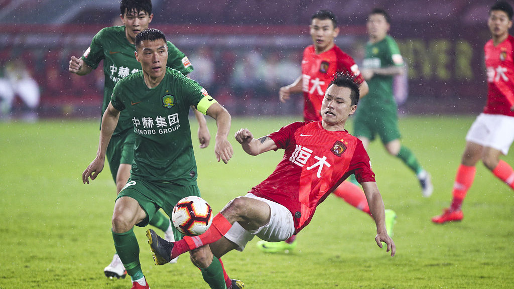 Beijing Guoan beat Guangzhou Evergrande to stay top of CSL - CGTN
