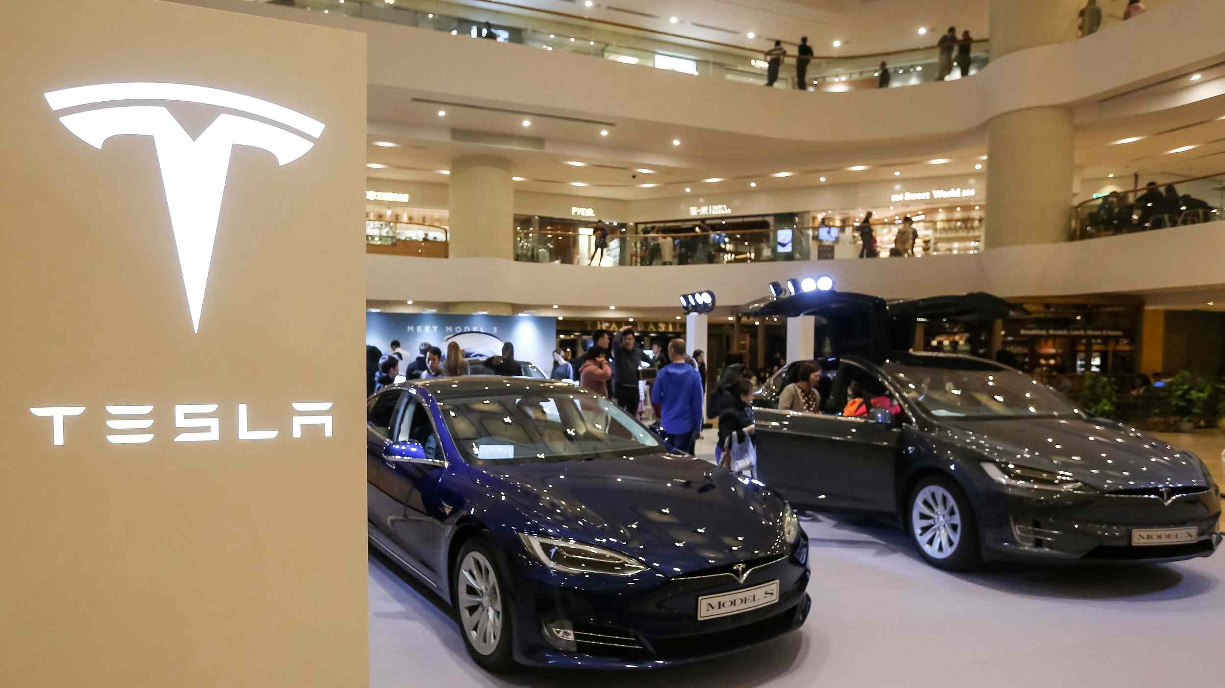 Tesla to raise vehicle prices, keep more stores open - CGTN