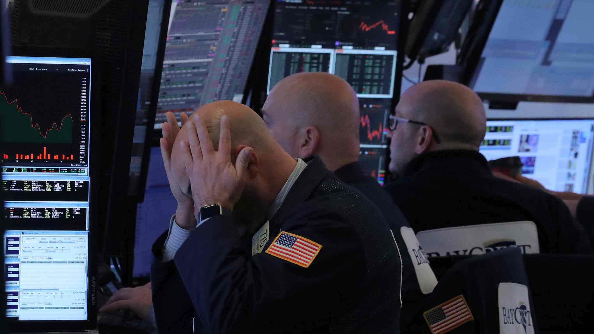 Wall Street stocks fell sharply in volatile trading on Friday, with the Nas...