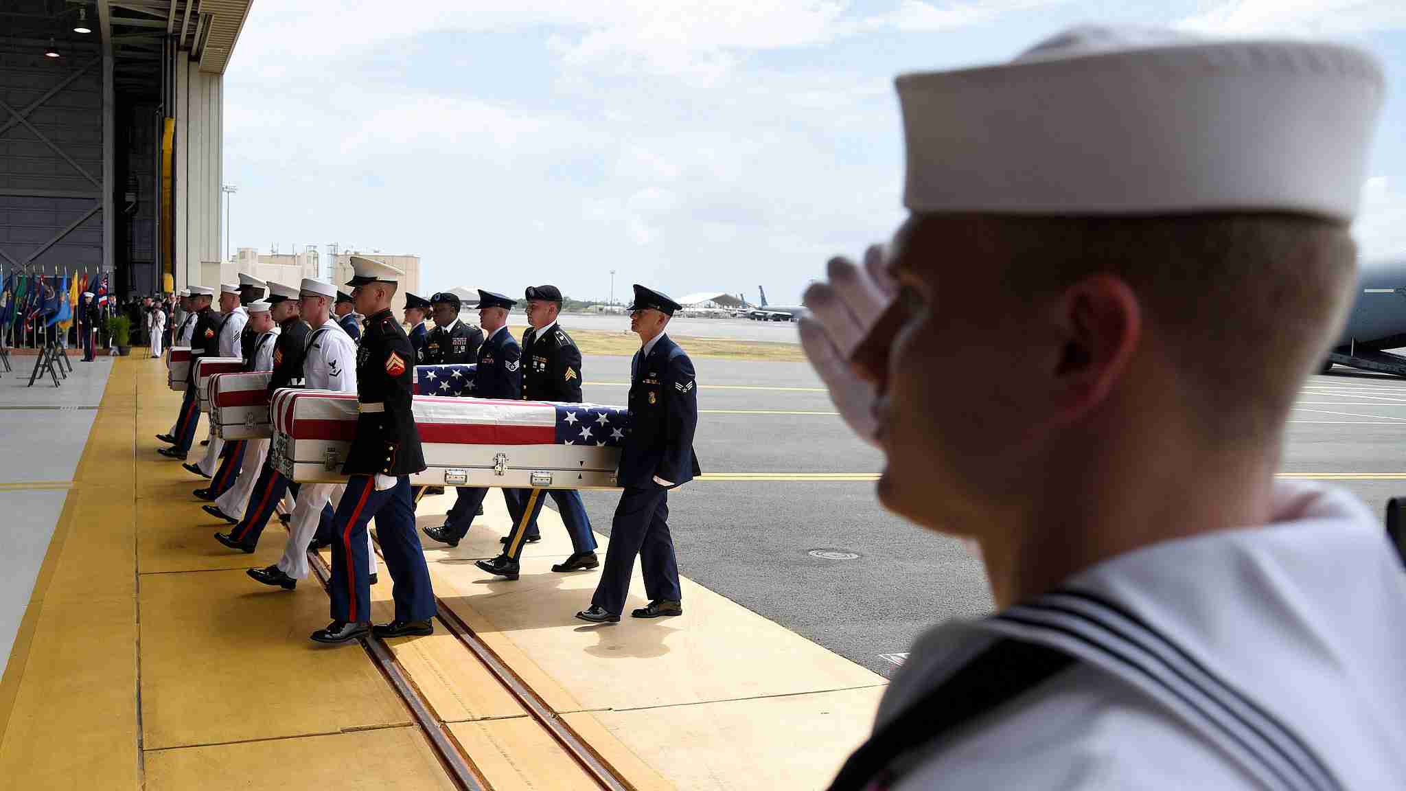 Remains of US Korean War dead arrive in Hawaii - CGTN