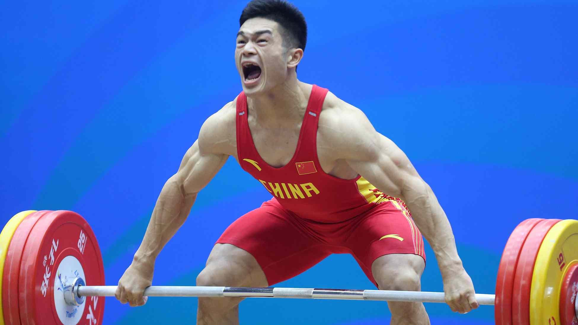Shi Zhiyong dominates IWF World Championships with three new world