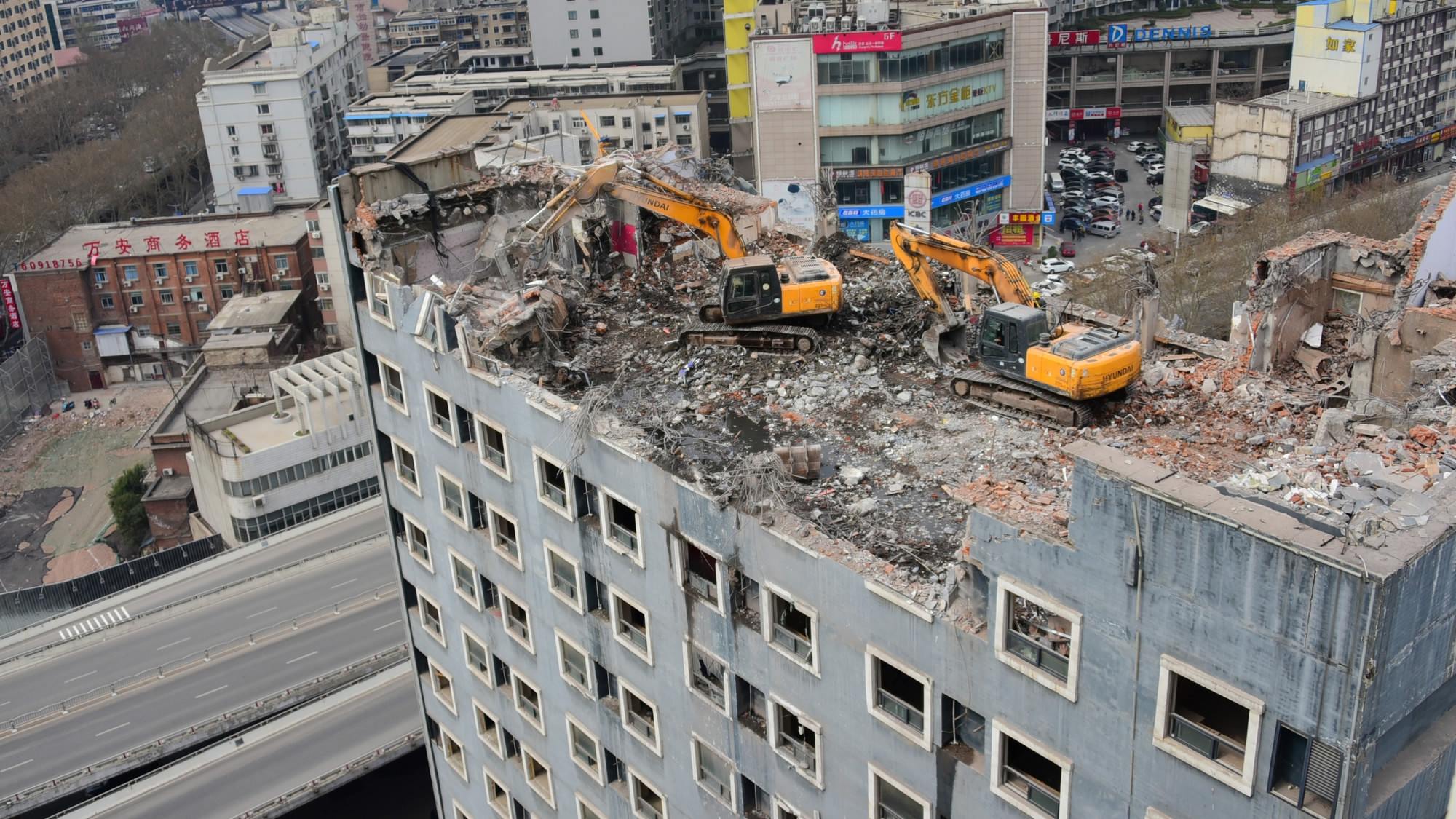 Excavators In Operation On Rooftop Worry Residents - Cgtn