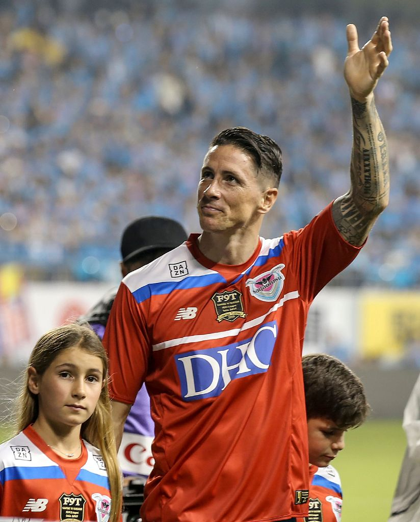 Fernando Torres stony-faced as he poses at empty stadium following Sagan  Tosu move