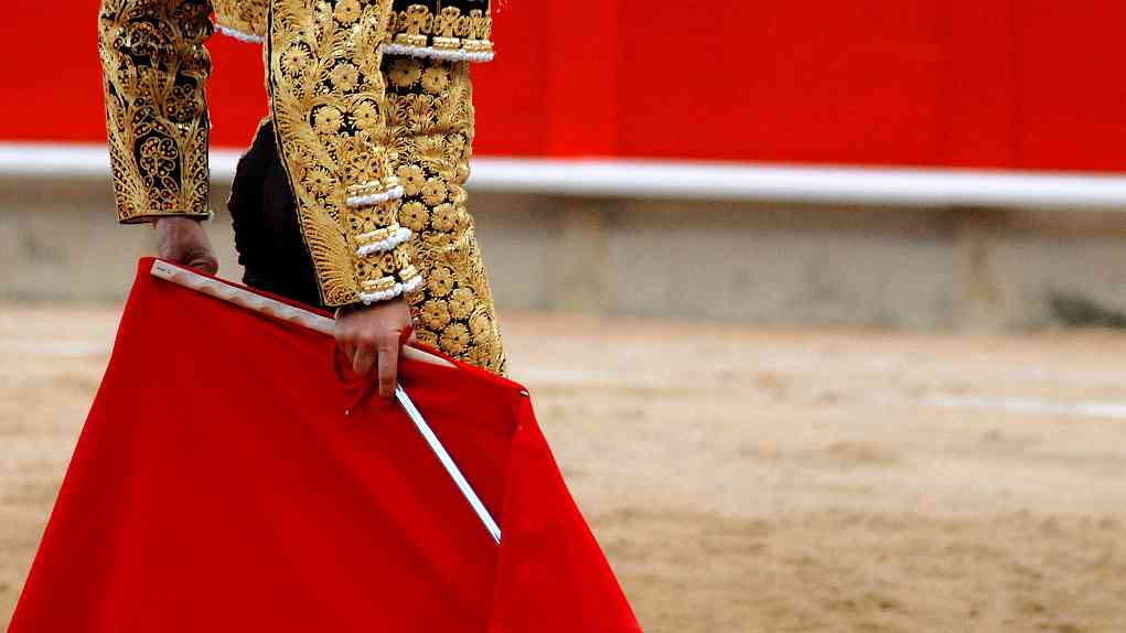 bullfighter red cape