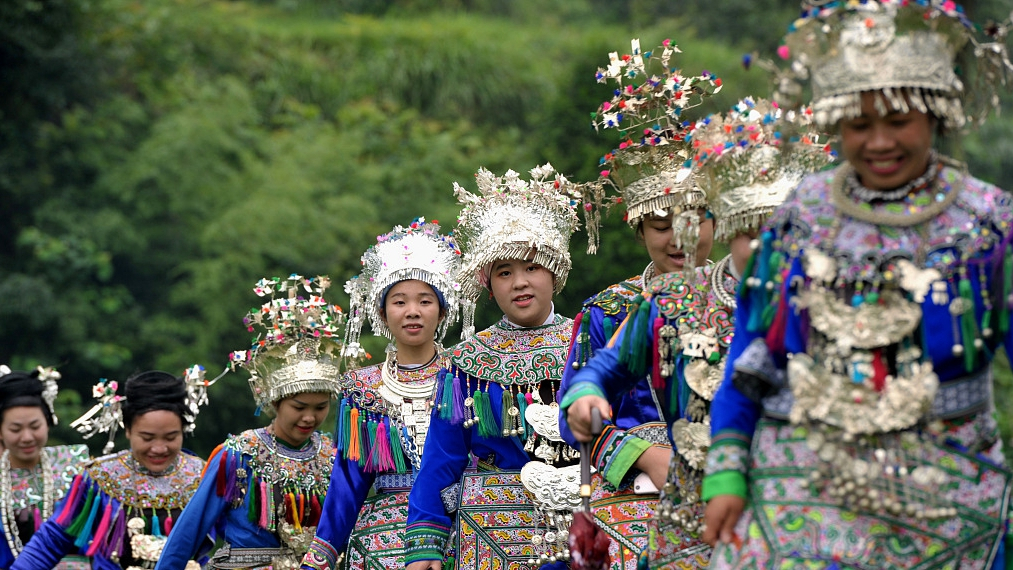 Dong ethnic group celebrates traditional Liuyueliu festival - CGTN